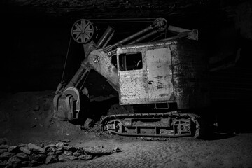 old excavator  in underground mine