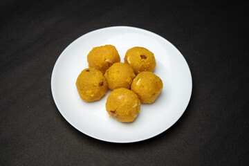 Plate of laddu, laddoo or ladoo a popular traditional Indian sweet treats made during festivals and religious ceremonies