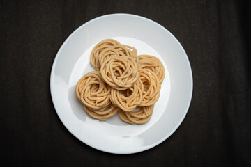 Murukku is a savoury snack popular in south India and Sri Lanka. chakli south indian traditional vegetarian snack