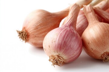 Fototapeta premium Detailed close-up of shallot bulbs on a white backdrop
