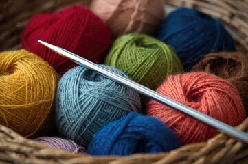Varied colored threads in a container alongside a knitting tool. The idea of crafting with needles. Close-up with minimal depth of field.