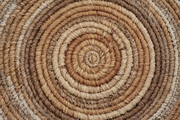 Fototapeta premium Handcrafted Round Wall Hanging in Warm Natural Shades