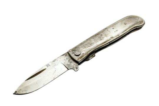 A weathered folding knife resting on a surface, showcasing its unique design and vintage character under bright lighting isolated on transparent background