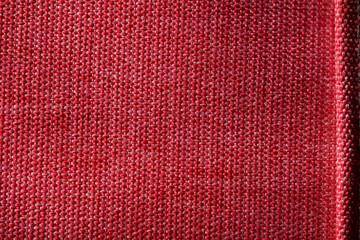 Closeup of Red Synthetic Woven Fabric Texture