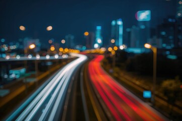 Obraz premium Nighttime urban scene with blurred traffic lights and bokeh effect