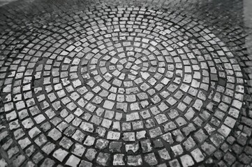 Overhead shot of circular stone pavement surface
