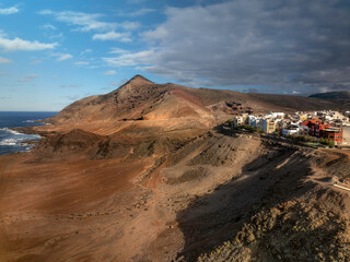 The aerial view of the residential area built on volcanic hill in Las Palmas de Gran Canaria, Spain