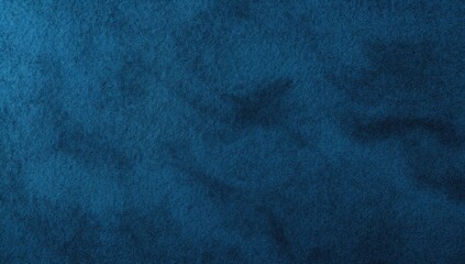 Abstract background of blue felt fabric texture with dark vignette and space for text