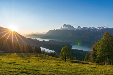 Stunning early morning light at a serene alpine lake surrounded by towering peaks in a charming natural environment.