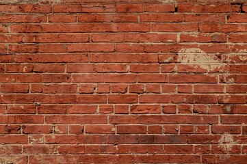 Naklejka premium Worn Painted Brick Surface with Vintage Texture