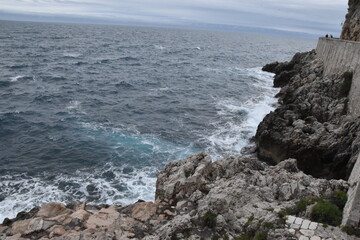 waves crashing on rocks