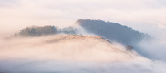 Fog Cloud Inversion rolling over the hills in the Peak District, taken from Higger Tor