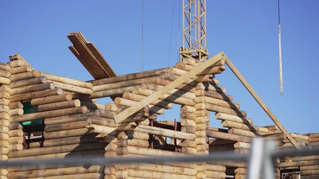 Construction site with wooden log houses