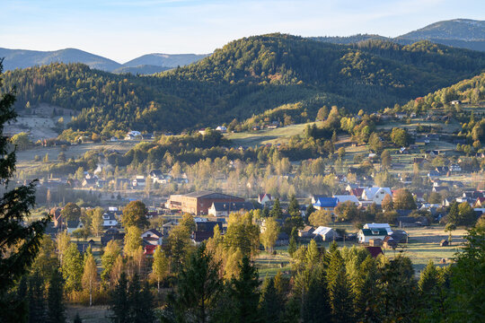 View of the village of Kosmach at dawning. Kosmach is a village located in the Carpathian Mountains, in Kosiv region, Ivano-Frankivsk Oblast, Ukraine. Autumn morning landscape.