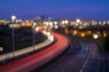 Fototapeta premium Photo with bokeh effect on a highway scene