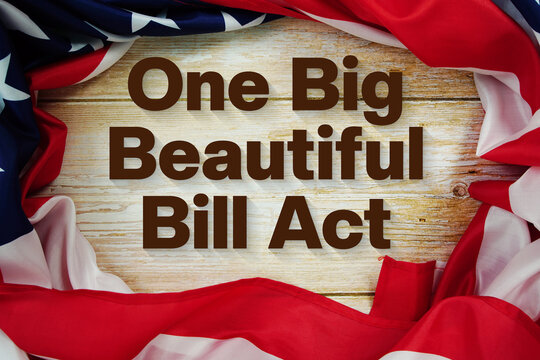 American flag with "OBBB The One Big Beautiful Bill Act" on wooden background