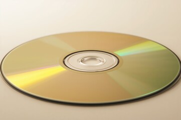 Macro shot of a compact disc with a yellow tint