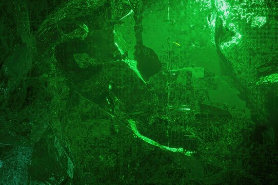 Abstract green plastic pattern resembling building blocks, concept for education and construction