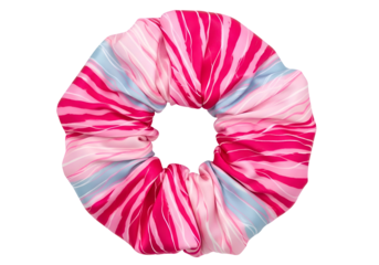 Vibrant pink and blue tie-dye scrunchie hair accessory isolated on black for fashion and beauty content isolated on transparent background