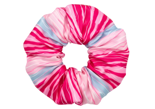 Vibrant pink and blue tie-dye scrunchie hair accessory isolated on black for fashion and beauty content isolated on transparent background