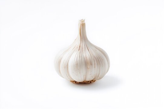 Clove of garlic on a plain white background