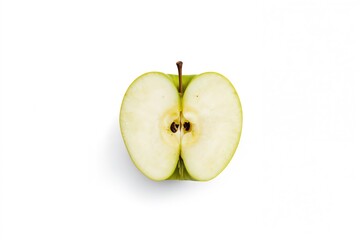 Half of a fresh green apple on a white surface