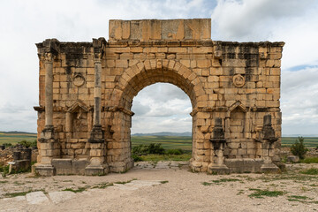 The triumphal Arch of Caracalla at Volubilis, one of most distinctive sights of the antique Roman city, Morocco
