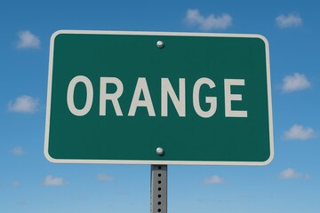 Green highway sign displaying "Orange" in white capital letters, set beneath a bright blue sky with scattered fluffy clouds.