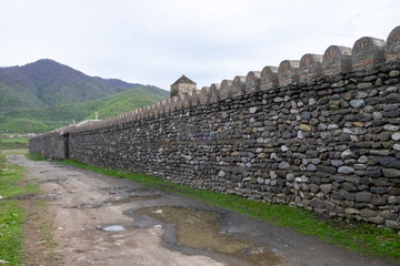 Pankisi, Georgia. 15 April 2021. Stone fortress wall with defensive tower