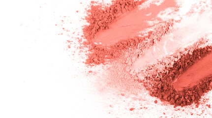 Smears of crushed coral blusher on white background