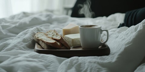 Enjoying a cozy breakfast in bed that features freshly brewed coffee and delicious toast