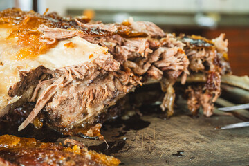 Extreme close up of a perfectly grilled beef rib, sliced to reveal the incredibly juicy and tender interior. Meat fibers and smoky crust visible.