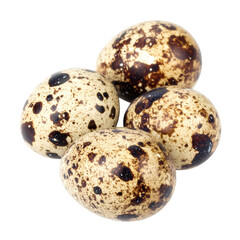 Fototapeta premium Several quail eggs with speckled, brown markings are presented against a stark black background, showcasing the organic textures and natural patterns of the eggshells.