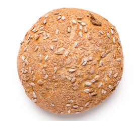 Loaf of healthy gluten free bread with sunflower seeds, isolated on white, top view
