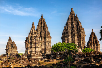 Prambanan temple near Yogyakarta on Java island, Indonesia against blue sky