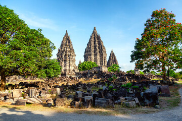 Prambanan temple near Yogyakarta on Java island, Indonesia against blue sky