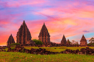Prambanan temple near Yogyakarta on Java island, Indonesia against colorful sunset