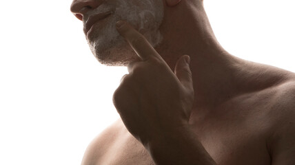 Man, razor and shaving with cream. Man posing. Background. Beauty. Male. 