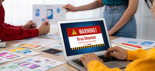 Virus warning alert on computer screen detected brisk cyber threat , hacker, computer virus and malware