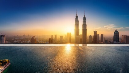 skyline features iconic twin towers at sunrise symbolizing resi