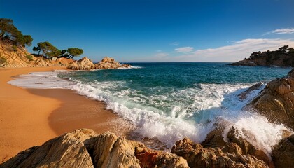 waves crashing on a secluded beach in spain s costa brava