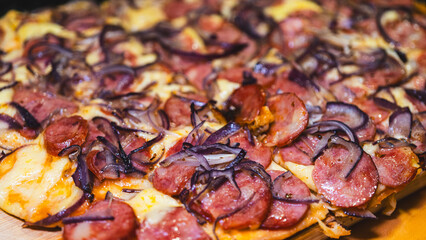Traditional Brazilian gourmet pizza with spicy calabresa sausage and mozzarella cheese. Perfect for food blogs and menus.