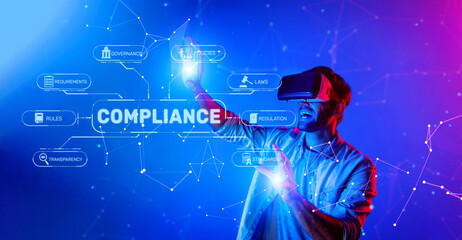 A young professional actively participating in virtual reality training focused on compliance and regulations, surrounded by digital elements highlighting various laws and requirements. XDMCP