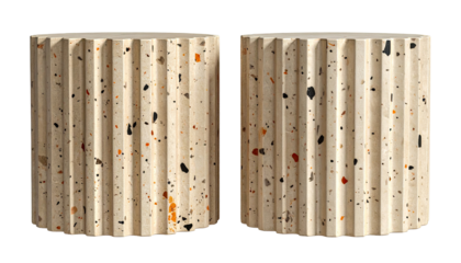 Two light beige, textured, decorative columns.  They feature a fluted design and a speckled, terrazzo-like surface