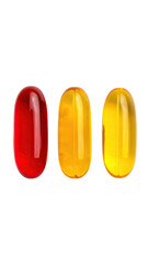 Three oblong capsules,  red,  orange-yellow,  and  yellow.  Close-up.  Food supplement