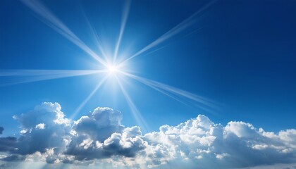 Bright Sun Rays Beaming Through Fluffy Clouds In A Clear Blue Sky Creating A Picturesque Scene With Copy Space Image