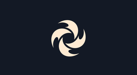 Abstract circular design with four stylized flame like elements.