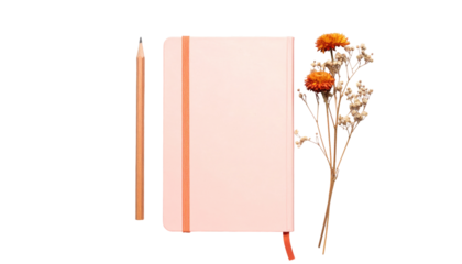 Pastel pink notebook, pencil, and dried flowers