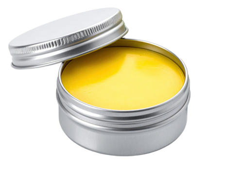 Bright yellow cream in a metal tin.  Lid partially open