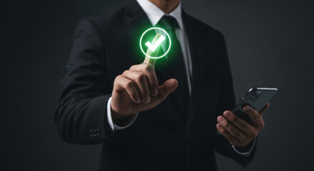 Successful businessman using smartphone to approve digital transaction with glowing checkmark, signifying efficiency and modern technology